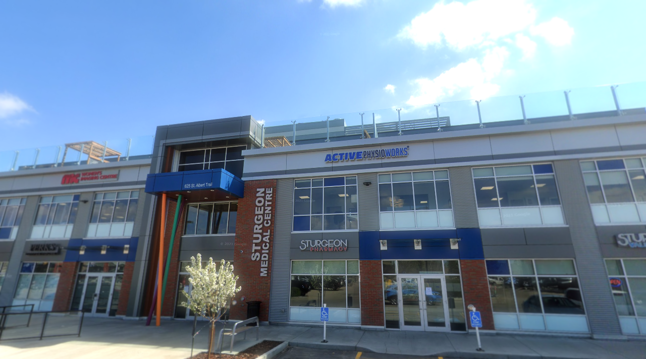 Outdoor view of front of clinic in summer